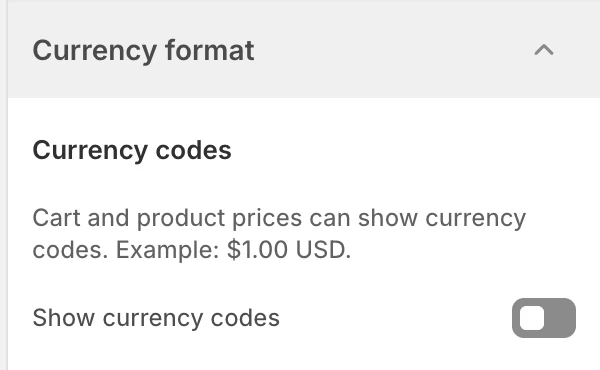 Currency format settings in the Theme Editor: Show currency codes.